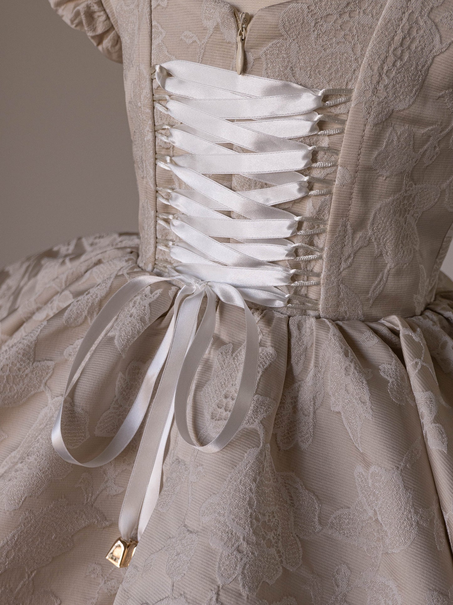 Dress in beige jacquard