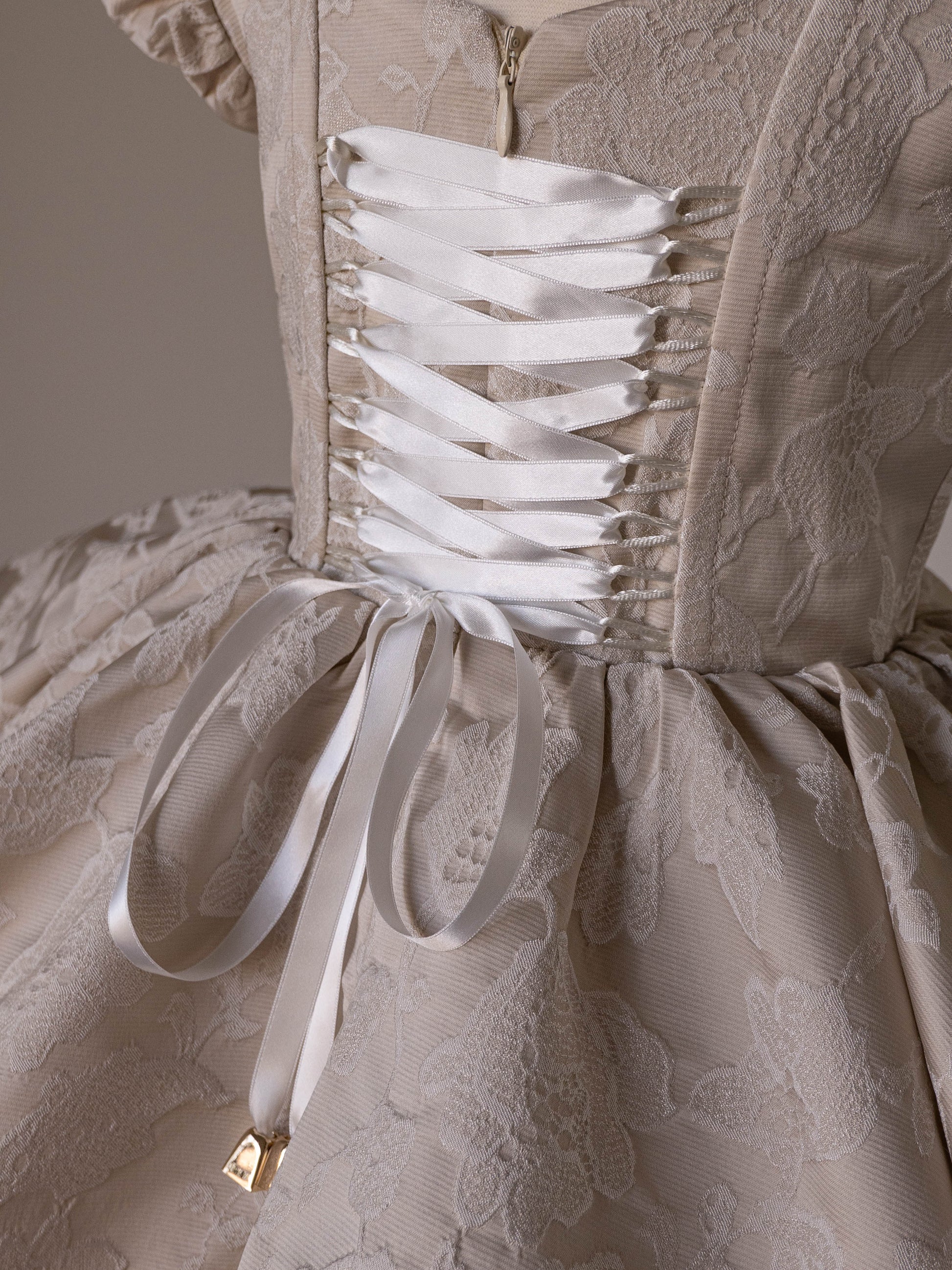 Dress in beige jacquard