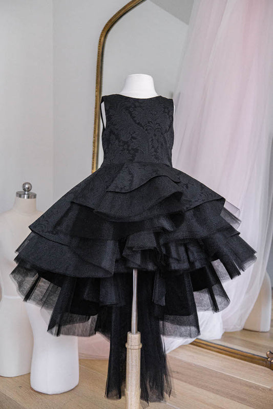 Julia in black asymmetric layered flower girl dress with ruffled tulle skirt for weddings and parties