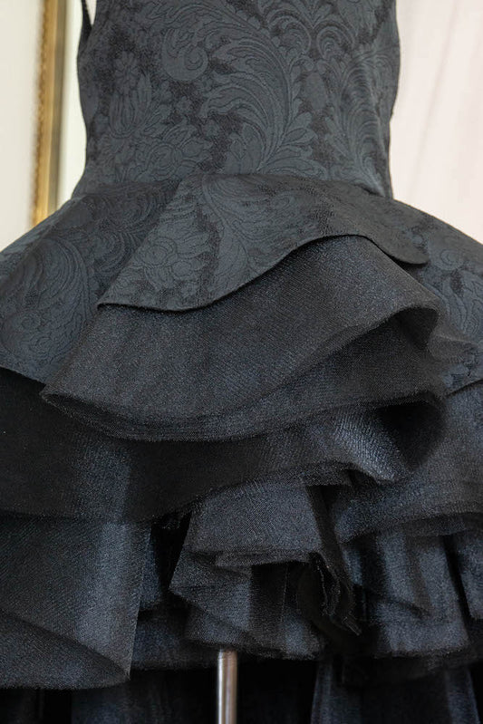 Julia in black asymmetric layered flower girl dress with ruffled tulle skirt for weddings and parties