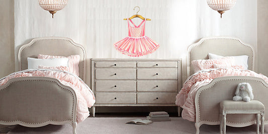 Pink ballerina tutu wall decal above dresser in girls bedroom with blush bedding