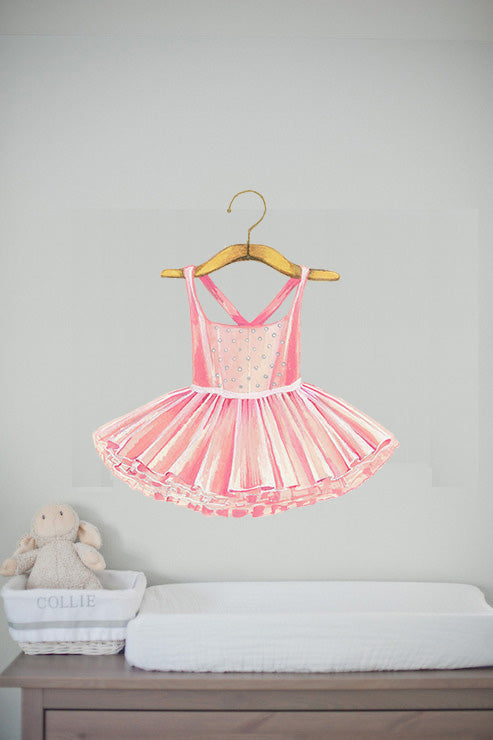 Pink ballerina tutu wall decal above dresser in girls bedroom with blush bedding
