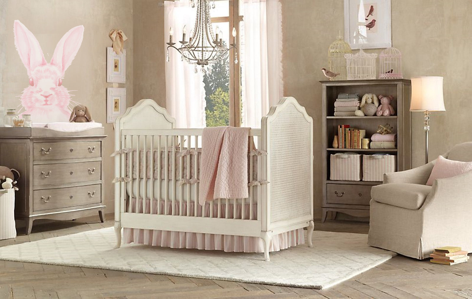 Pink bunny wall decal above white crib in modern baby nursery room
