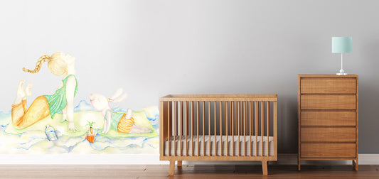 Yoga girl wall decal on nursery room wall behind white kids bed